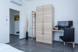 Postel nebo postele na pokoji v ubytování Turmöl Hotel