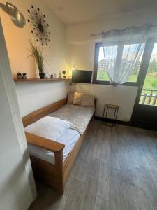 En eller flere senge i et værelse på STUDIO AURON