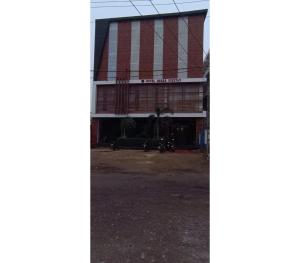 a view of the front of a building at Hotel Shree Nikatan in Ara +26 photos
