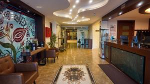 Et opholdsområde på Airport Global Hotel