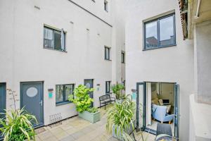 an apartment with a glass door on the side of a building at 3 Bed in Woolacombe oc-s29462 in Woolacombe