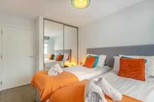 En eller flere senge i et værelse på 2 Bed in Woolacombe oc-b29810 + 23 billeder