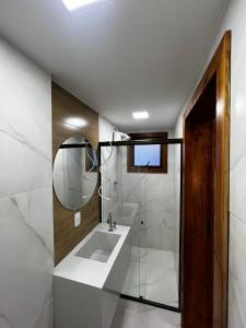 Phòng tắm tại Pousada do Rui