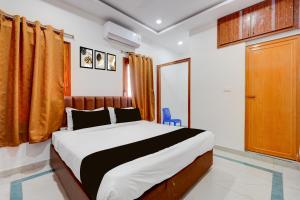 Giường trong phòng chung tại Varahi Stay Inn +20 ảnh