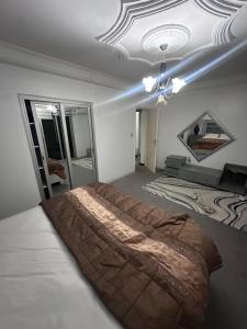 Postel nebo postele na pokoji v ubytování Hebergement centenaire