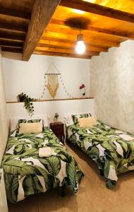 Postel nebo postele na pokoji v ubytování A casa do Porto cerca de Cedeira y de la playa de Pantín