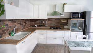 Køkken eller tekøkken på Appartamento Pesaro - Casa Nana