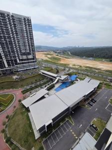 an overhead view of a building in a parking lot at Adelia SweetHome in Kajang