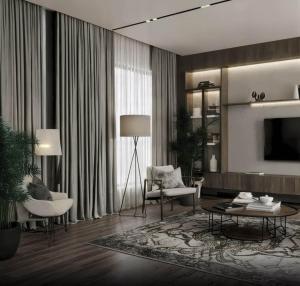 een woonkamer met een bank en een tafel bij Victoria Residences in St Ives