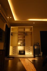 an empty refrigerator with its door open in a room at Munir`s residence 2 in Cairo
