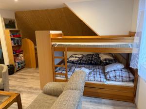 Postel nebo postele na pokoji v ubytování Chalupa u lesa v Železných horách