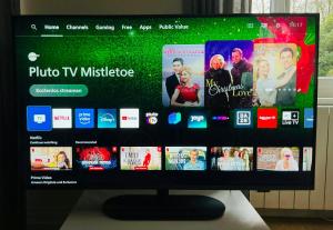 ein Computermonitor auf einem Tisch in der Unterkunft Renovated Stone House In Normandy in Sourdeval-les-Bois + 27 Fotos