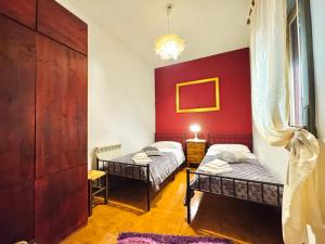 Katil atau katil-katil dalam bilik di ò Firrìu