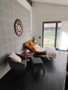 Posezení v ubytování Stadt und See Nahes Appartment