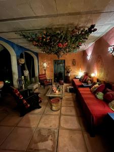 Khu vực ghế ngồi tại L'Ancienne Taverne Chambres d'hôtes et Gîtes