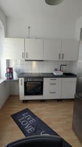 Nhà bếp/bếp nhỏ tại Schickes Apartment mit Stil - 58qm groß