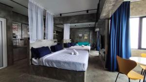 Postel nebo postele na pokoji v ubytování Happy Stay - Golden Hills , Genting Highlands