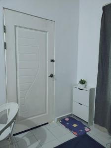 Et badeværelse på Rezquna Homestay + 2 billeder