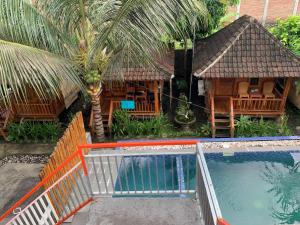 an aerial view of a resort with a swimming pool at Pondok Elen Mandalika in Praya