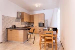 Kuchyň nebo kuchyňský kout v ubytování Dimora dAcqua e Charme