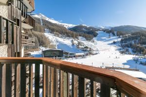 a view from a balcony of a ski resort at Les Orres Plein Sud - Studio avec balcon in Les Orres