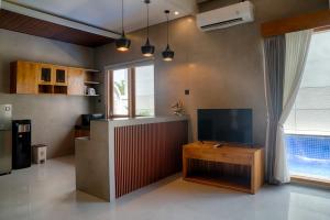 TV a/nebo společenská místnost v ubytování Lebak Bali Residence