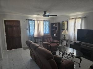 TV a/nebo společenská místnost v ubytování Relax in Paradise