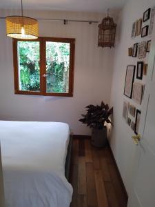 Postel nebo postele na pokoji v ubytování Les Fougères + 14 fotografií