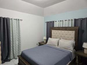 Postel nebo postele na pokoji v ubytování Relax in Paradise + 10 fotografií