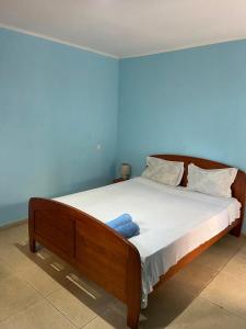 Giường trong phòng chung tại Mandinga Guest house