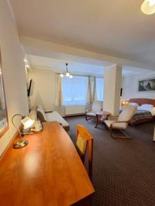 Giường trong phòng chung tại Hotel Diament