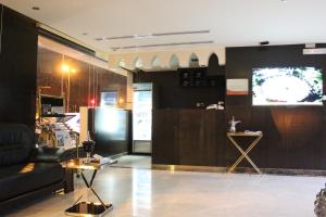 Et tv og/eller underholdning på شقق روز للشقق المخدومة