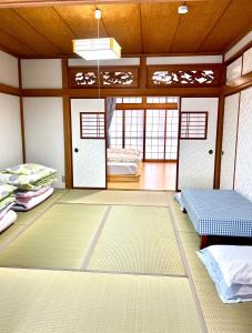 Postel nebo postele na pokoji v ubytování Minnpaku nami - Vacation STAY 60554v + 18 fotografií