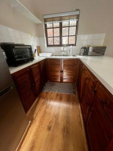 Kuchyň nebo kuchyňský kout v ubytování Melville koppies view guest house