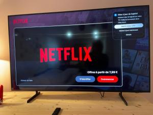 a television screen with the netflix sign on it at Studio Alsace in Kirchheim