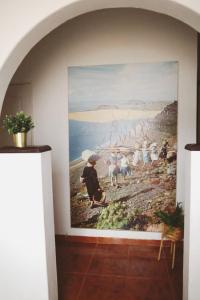 a large painting on the wall in a room at Casa Olga in Caleta de Sebo