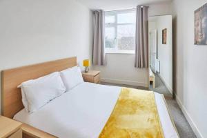 Postel nebo postele na pokoji v ubytování 2-Bedroom Serviced Apartment Marske-by-the-Sea 2