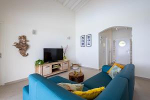 Et tv og/eller underholdning på Coral Estate Rentals