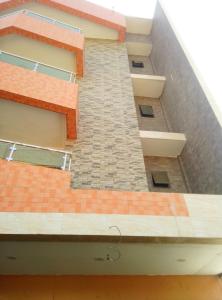 アビジャンにあるRésidence Toyotaの屋根の建物の模型