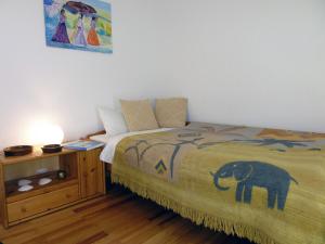 Giường trong phòng chung tại Ferienwohnung am Wald Dörlinbach