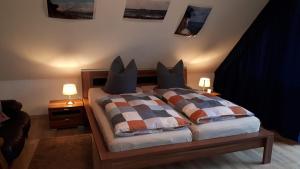 Postel nebo postele na pokoji v ubytování Ferienwohnung Jansen