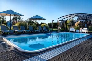 Swimmingpoolen hos eller tæt på Słoneczny Zakątek