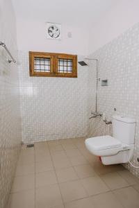 Et badeværelse på Alite Posh 4 BHK Villa in Thrissur Town