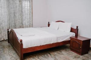 En eller flere senge i et værelse på Alite Posh 4 BHK Villa in Thrissur Town