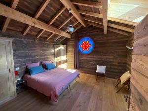 En eller flere senge i et værelse på Le Nid des Roches