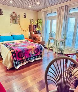 En eller flere senge i et værelse på Green house, cosy garden Paris