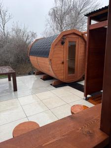 a wooden sauna sitting on top of a patio at Wellness Oase in Paderborn