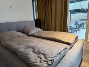 two pillows on top of a bed in a room at Wellness Oase in Paderborn +6 photos