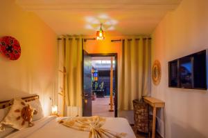 TV a/nebo společenská místnost v ubytování Auberge Prince