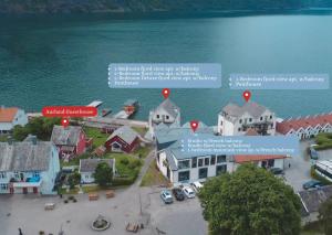 a map of a small town next to the water at Wangen Apartments in Aurland